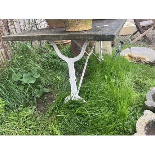 210 - Wooden top and cast iron base garden table - Approx size: L 120cm W 61cm H 71cm