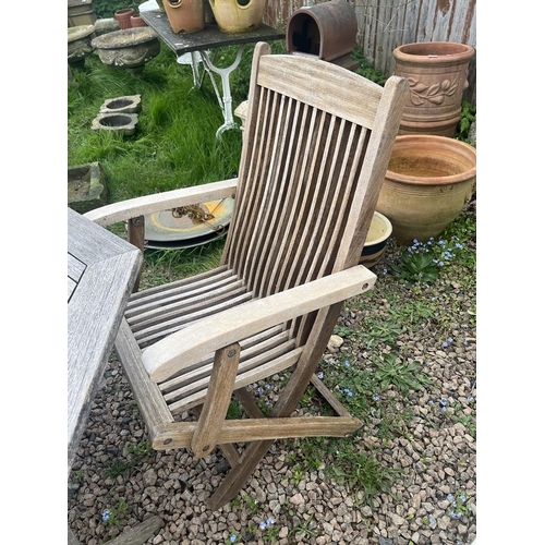 218 - Octagonal teak garden table with 3 chairs