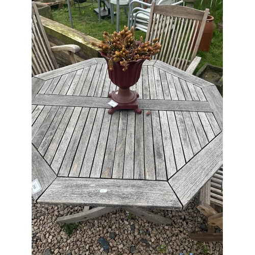 218 - Octagonal teak garden table with 3 chairs