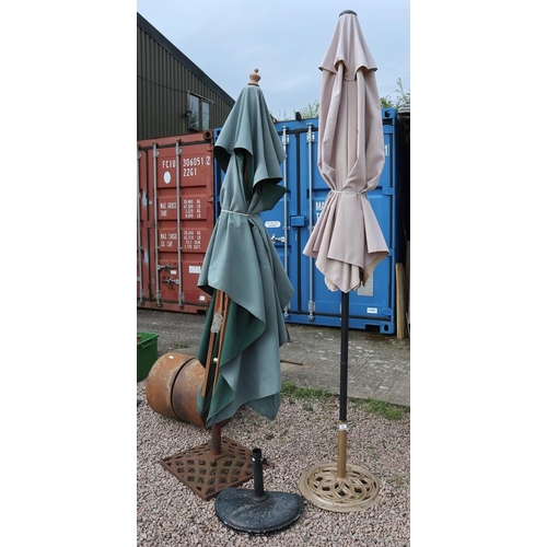 330 - 2 garden parasols with heavy metal bases