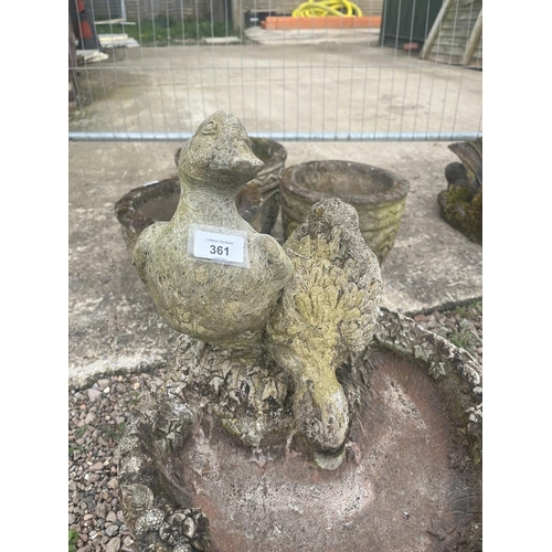 361 - Stone birdbath adorned with ducks