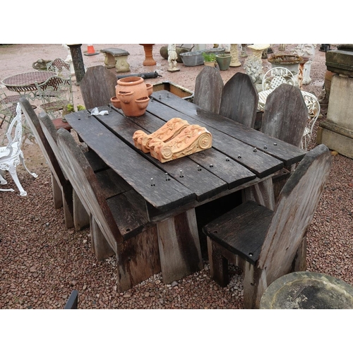 461 - Large and heavy oak table with 8 chairs