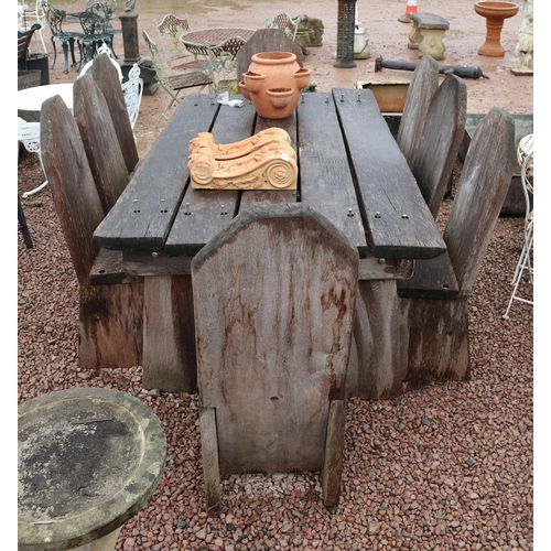 461 - Large and heavy oak table with 8 chairs