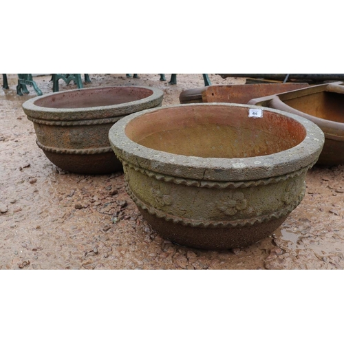 495 - Pair of circular stone planters