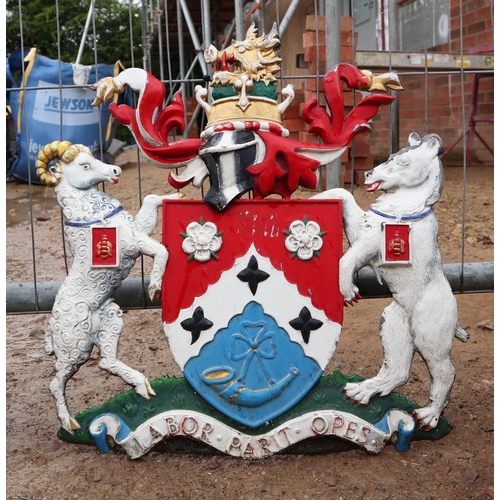 506 - 2 metal Coats of Arms