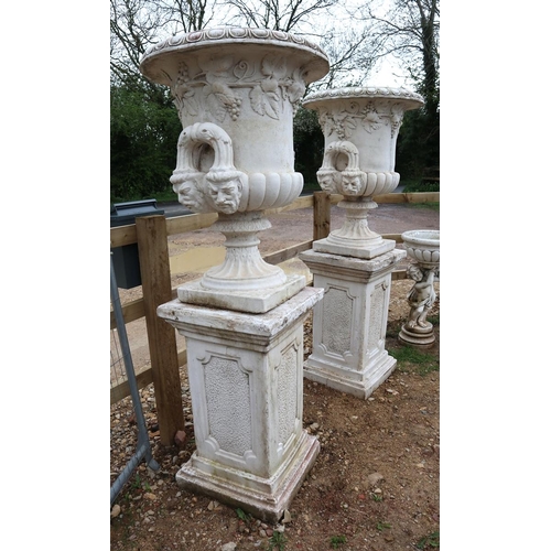 555 - Large and impressive pair of pedestal recon stone handled planters on plinths in white - Approx heig... 