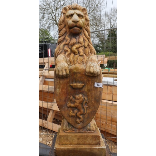 561 - Sitting stone lion with crest on plinth - Approx height: 130cm