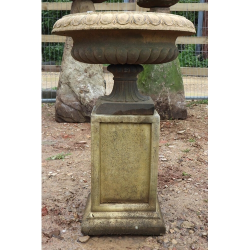 569 - Victorian terracotta urn on later recon stone plinth