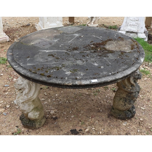 573 - Large stone circular lion themed garden table - Approx size: Diameter: 136cm H: 73cm