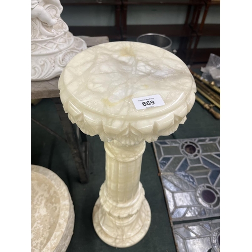 669 - Pedestal planter together with marble torchere