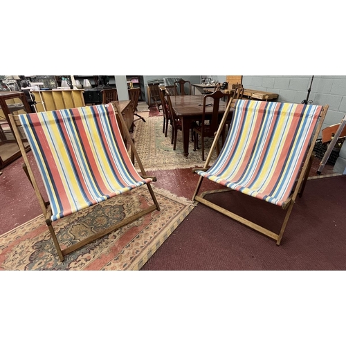 696 - Pair of large deckchairs