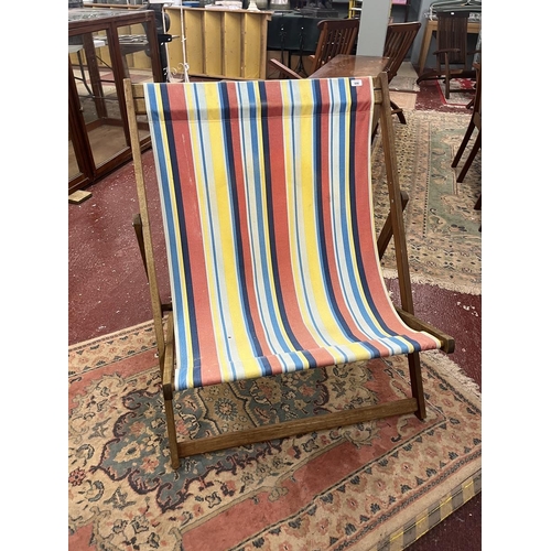 696 - Pair of large deckchairs