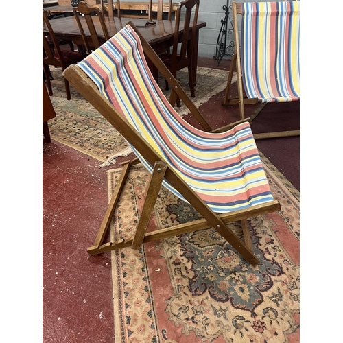 696 - Pair of large deckchairs