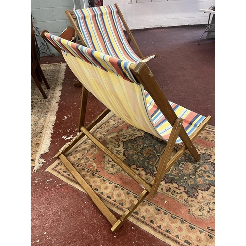 696 - Pair of large deckchairs