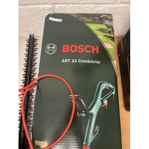 708 - Bosch ART 23 Combitrim together with a Bosch AHS 50-16 hedge trimmer