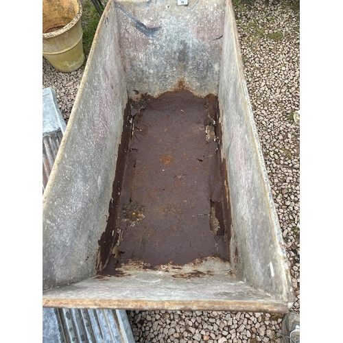 78 - Galvanised feeder on trolley