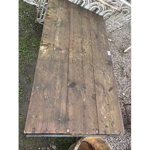 88 - Wooden table with cast iron ends