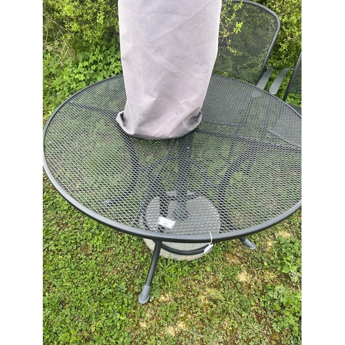 97 - Mesh topped circular table and 2 chairs (with cushions) together with parasol