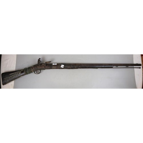 138 - Antique flintlock rifle A/F