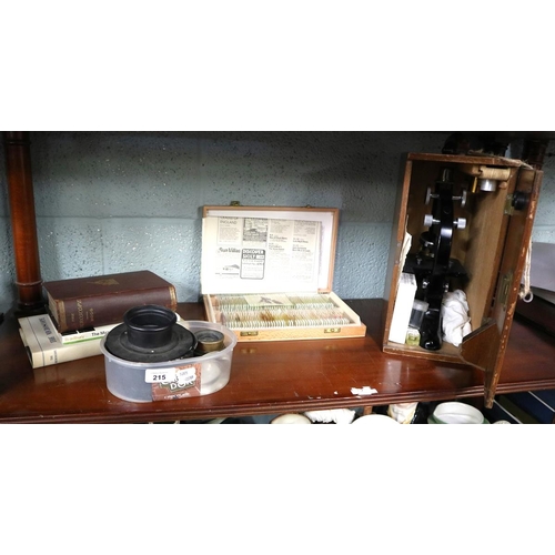 215 - Vintage microscope from Malvern girls school together with slides, book & a Collection of optica... 