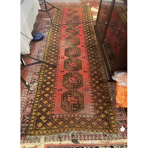 305 - Large red patterned runner - Approx size: 300cm x 89cm