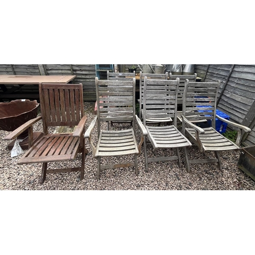 504 - 7 folding teak chairs