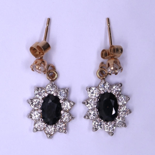 64 - Pair of 9ct gold CZ earrings