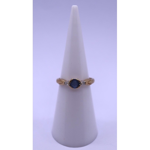 65 - 9ct gold sapphire & diamond ring - Size J