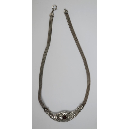 77 - Silver necklace with garnet centerpiece