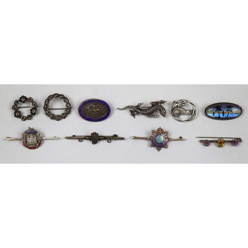 90 - 10 silver brooches