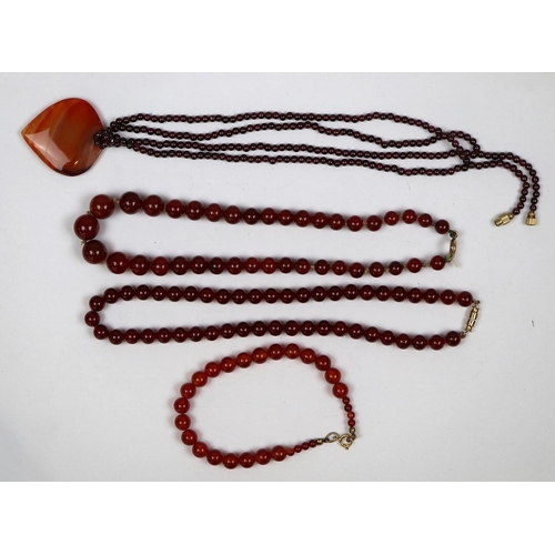 93 - Collection of carnelian jewellery together with a garnet bead necklace with a agate heart pendent