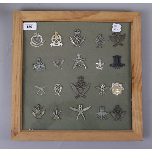 180 - Collection of framed and loose military badges and buttons together with a model of a knights armour