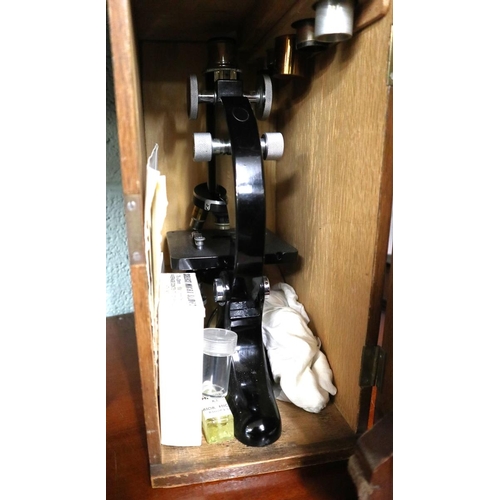 215 - Vintage microscope from Malvern girls school together with slides, book & a Collection of optica... 