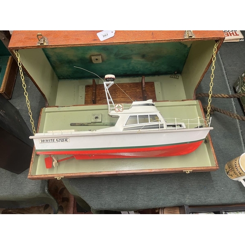 267 - Motorised model boat in wooden case