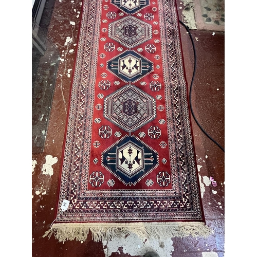 268 - Belgian red pattered runner - Approx 230cm x 68cm