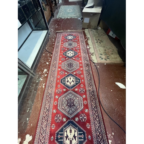 268 - Belgian red pattered runner - Approx 230cm x 68cm