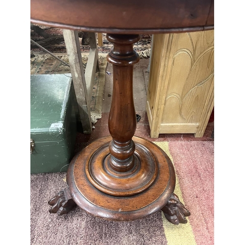 296 - Antique mahogany hall table on claw feet & wooden casters - Approx size: Diameter 52cm, Height 7... 