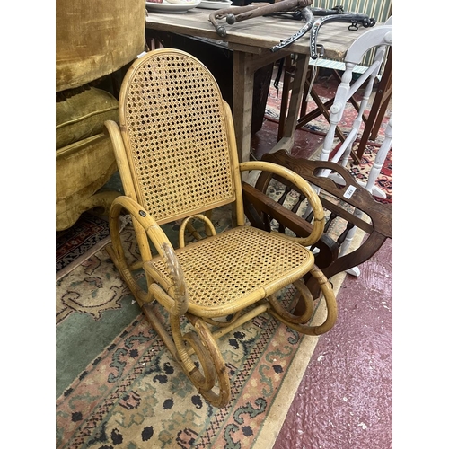 303 - Wicker and bamboo childs rocking chair together with a folding magazine rack and painted towel rail