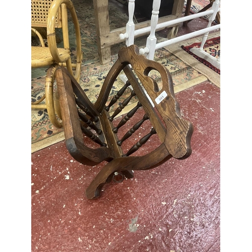 303 - Wicker and bamboo childs rocking chair together with a folding magazine rack and painted towel rail