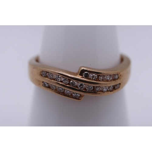 39 - 9ct gold channel set diamond ring - Size M