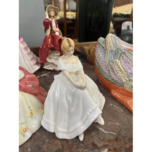 404 - Collection of Royal Doulton figurines