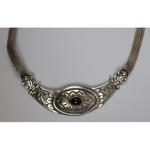 77 - Silver necklace with garnet centerpiece