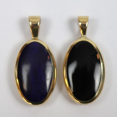 79 - 2 9ct gold reversable pendants set with onyx & mother-of-pearl