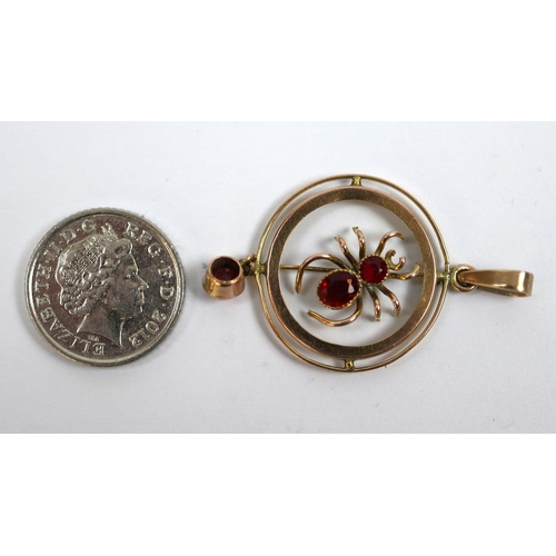 82 - 9ct gold spider pendent set with rubies 