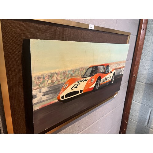 144 - Framed oil on canvas of a Chevron B8 racing car signed D Troughton '83 - Approx 86cm x 53cm