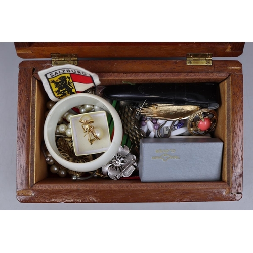 103 - Collection of costume jewellery to include silver in a wooden box