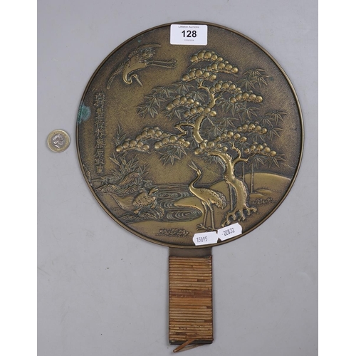 128 - Antique Oriental hand mirror