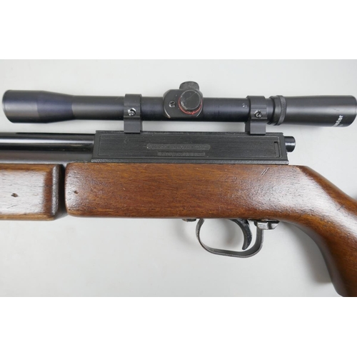 137 - Japanese 1970's Sharp Innova .22 pump air rifle to include Bushmaster telescopic sights