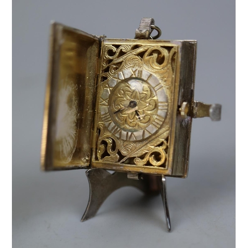 14 - St James House Company silver & gilt book form watch