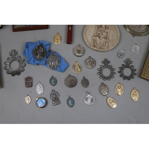 144 - Collection of religious artifacts to include 2 1931 Society of Walsingham badges